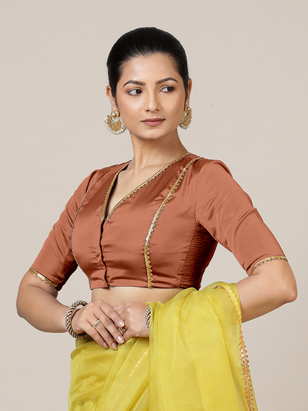 Begum x Tyohaar Saree Blouse, in Copper Vegan Silk, featuring elbow sleeves and v-neckline, made for party & festive (view 7).