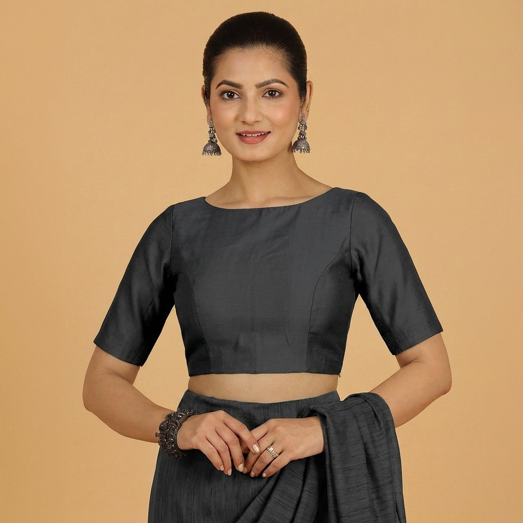 Jigyasa x Tyohaar Saree Blouse, in Black Chandheri, featuring elbow sleeves and boat neckline, made for party & festive.