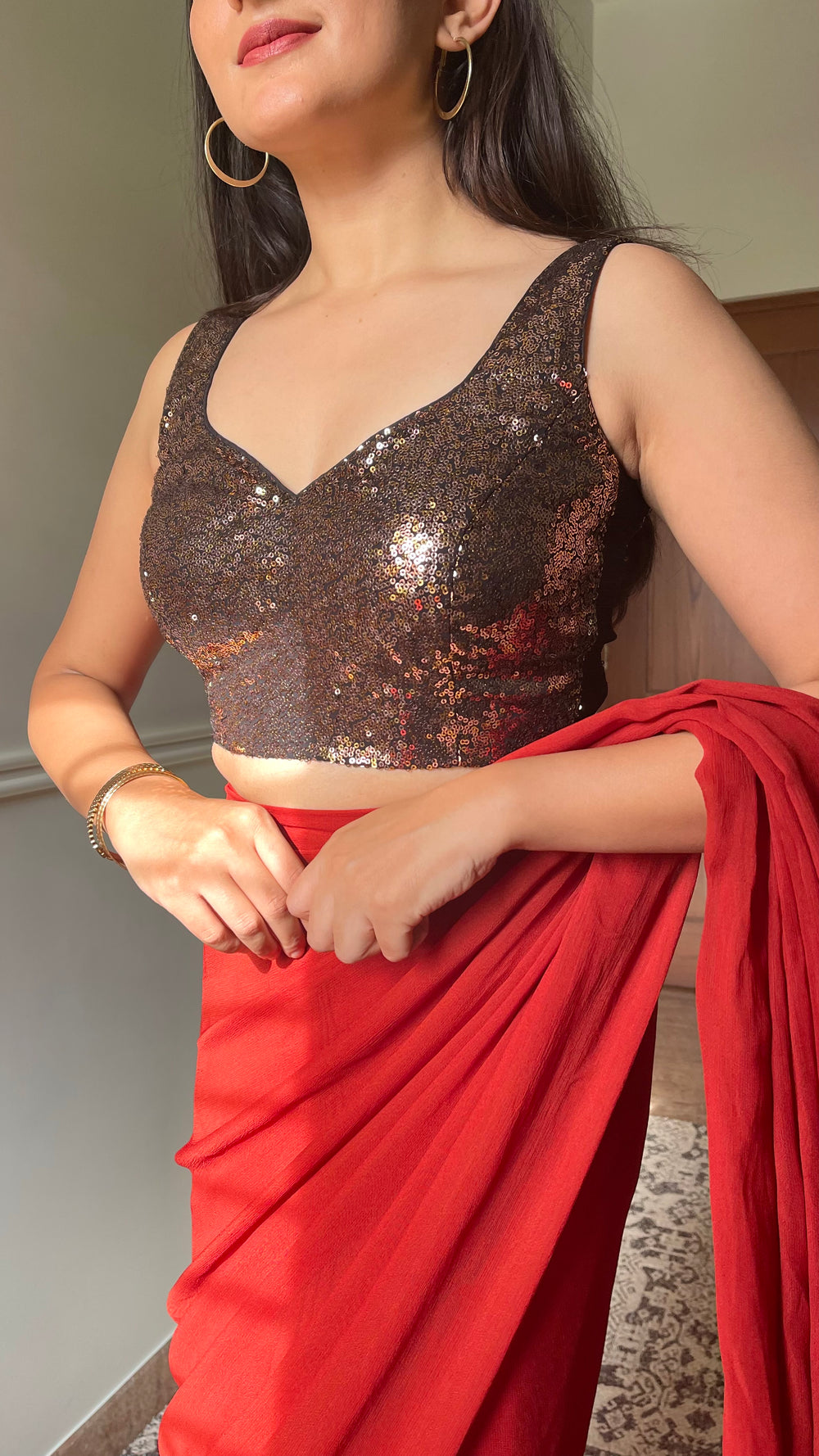 Kanika x Tyohaar | Sleeveless Black & Gold Sequined Saree Blouse with Sweetheart Neck
