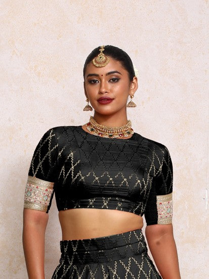 Kashvi x Tyohaar Saree Blouse, in Black Viscose Silk Brocade, featuring elbow sleeves and jewel neckline (view 6).