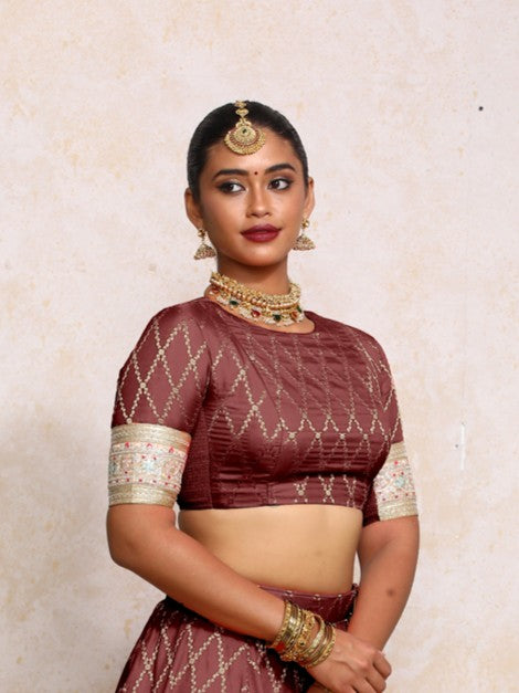 Kashvi x Tyohaar Saree Blouse, in Maroon Viscose Silk Brocade, featuring elbow sleeves and jewel neckline (view 3).
