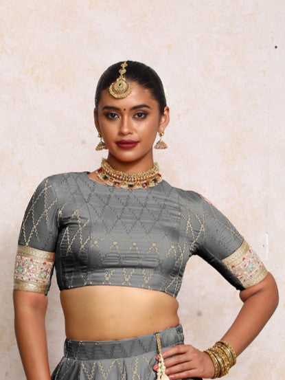 Kashvi x Tyohaar Saree Blouse, in Grey Viscose Silk Brocade, featuring elbow sleeves and jewel neckline (view 6).