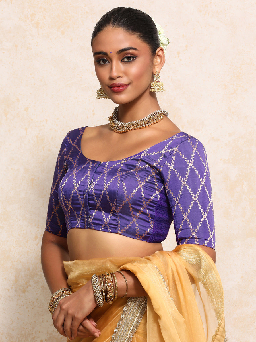 Kumkum x Tyohaar Saree Blouse, in Purple Viscose Silk Brocade, featuring elbow sleeves and round neckline.