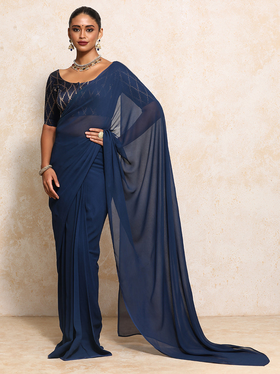 Kumkum x Tyohaar Saree Blouse, in Blue Viscose Silk Brocade, featuring elbow sleeves and round neckline (view 7).