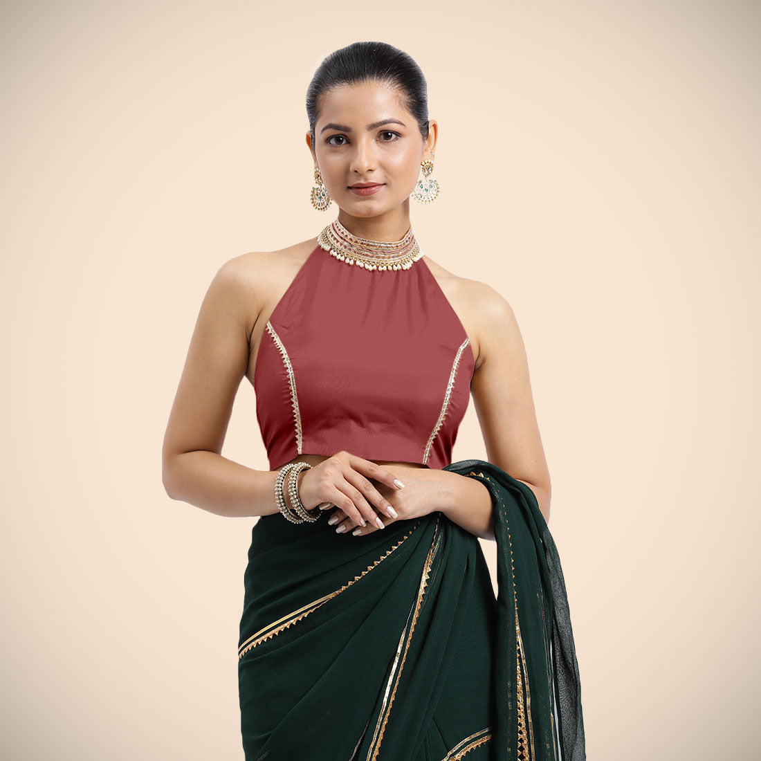 Laila x Tyohaar Saree Blouse, in Red Vegan Silk, featuring sleeveless and halter neckline, made for party & festive.