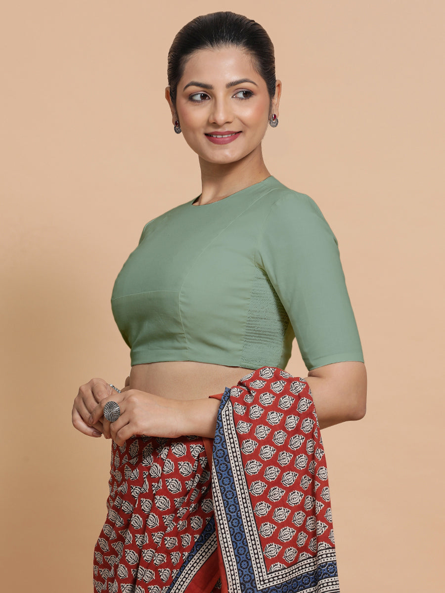 Lara x Rozaana Saree Blouse, in Green Linen, featuring elbow sleeves and jewel neckline, made for daily & work (view 7).
