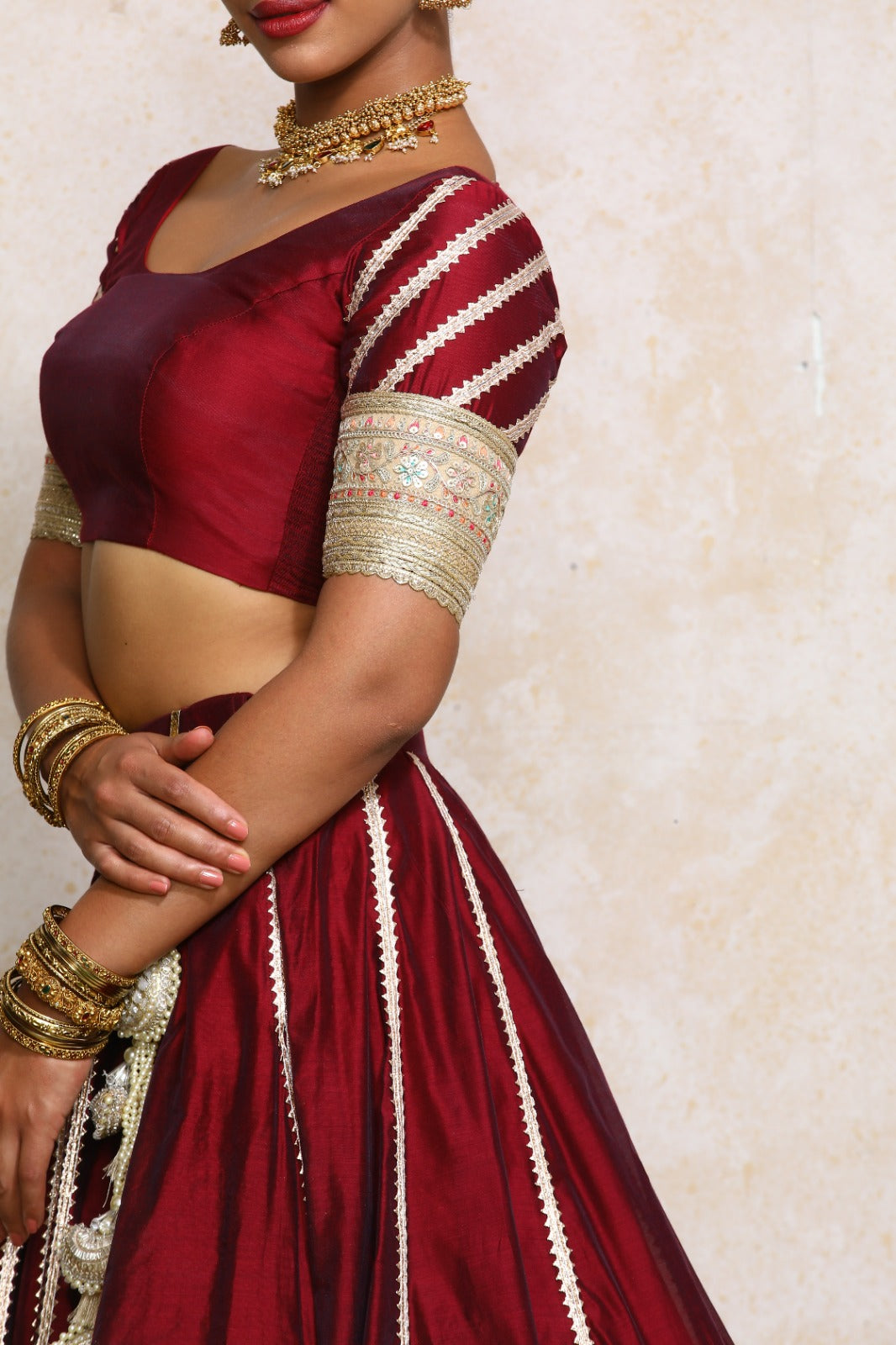 Manika x Tyohaar Saree Blouse, in Maroon Chandheri, featuring elbow sleeves and scoop neckline, made for party & festive.