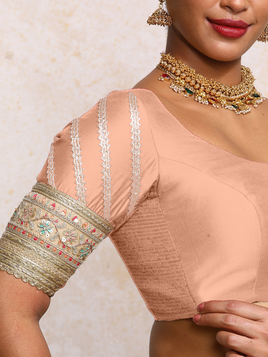 Manika x Tyohaar Saree Blouse, in Peach Chandheri, featuring elbow sleeves and scoop neckline, made for party & festive.