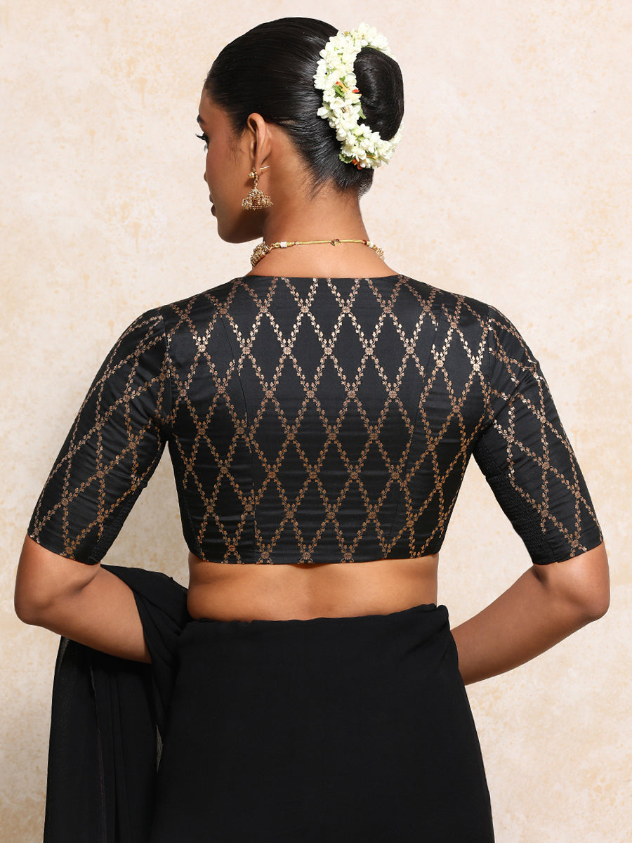 Manisha x Tyohaar Saree Blouse, in Black Viscose Silk Brocade, featuring elbow sleeves and v-neckline (view 2).