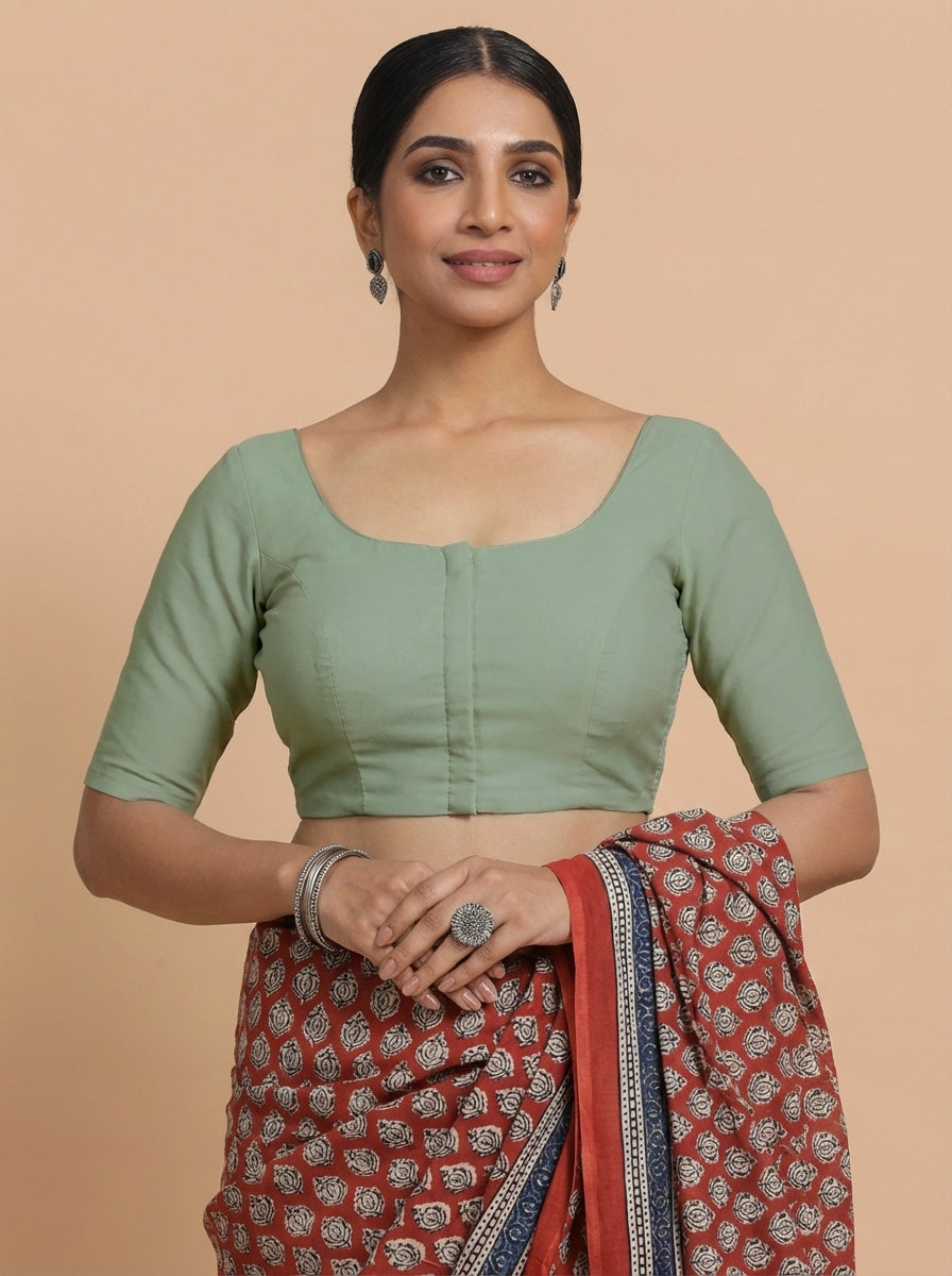 Meghna x Rozaana Saree Blouse, in Green 70% Cotton 30% Linen, featuring elbow sleeves and round neckline.