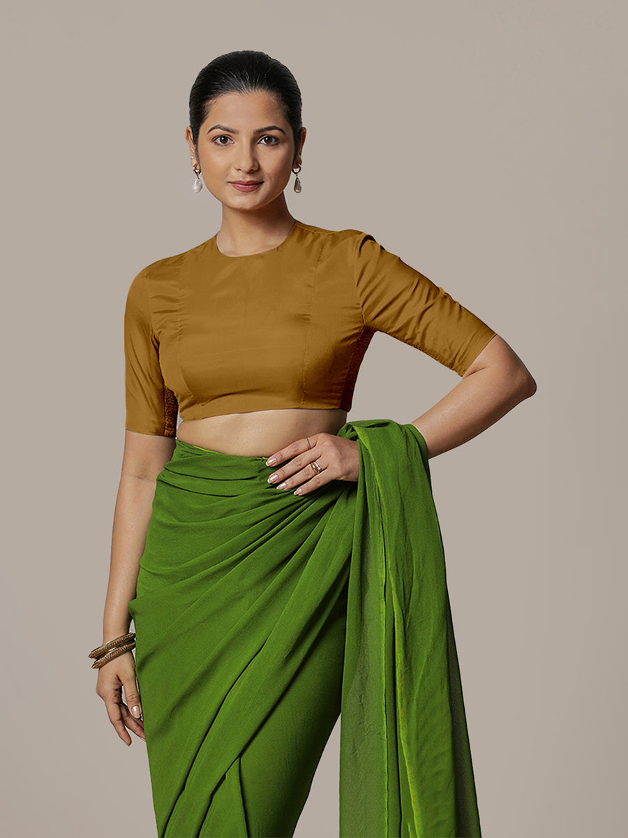 Myra x Rozaana Saree Blouse, in Gold Vegan Silk, featuring elbow sleeves and jewel neckline, made for party & festive (view 5).