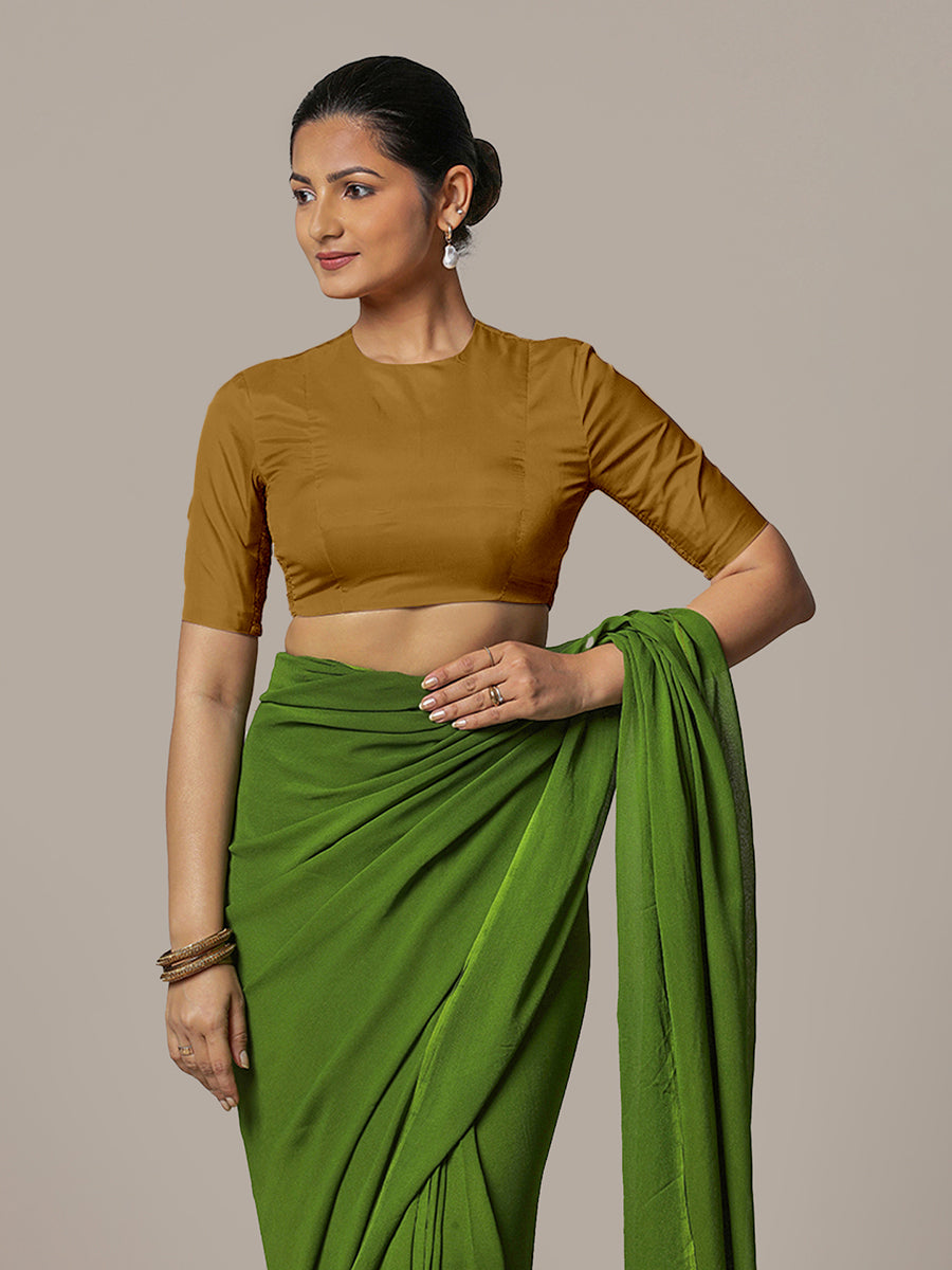 Myra x Rozaana Saree Blouse, in Gold Vegan Silk, featuring elbow sleeves and jewel neckline, made for party & festive (view 6).