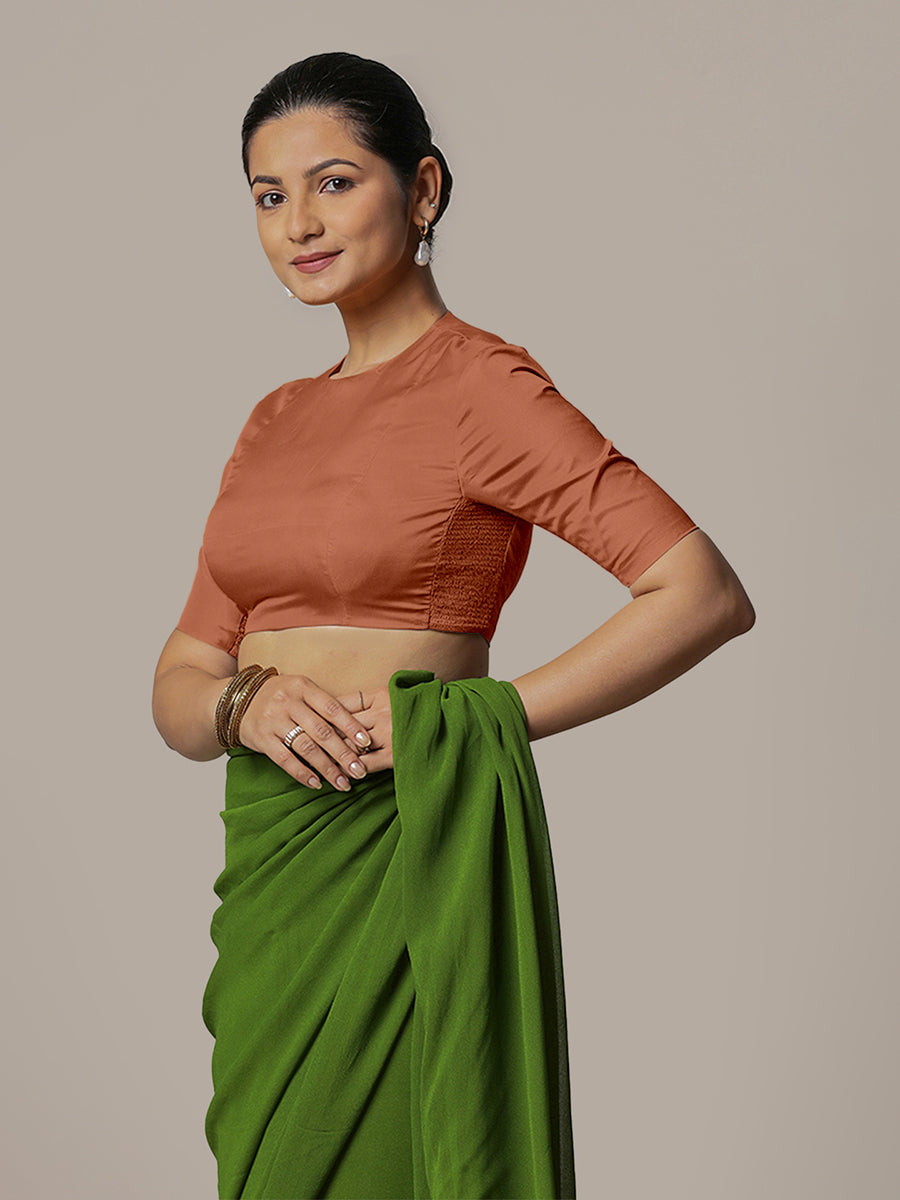 Myra x Rozaana Saree Blouse, in Copper Vegan Silk, featuring elbow sleeves and jewel neckline, made for party & festive.