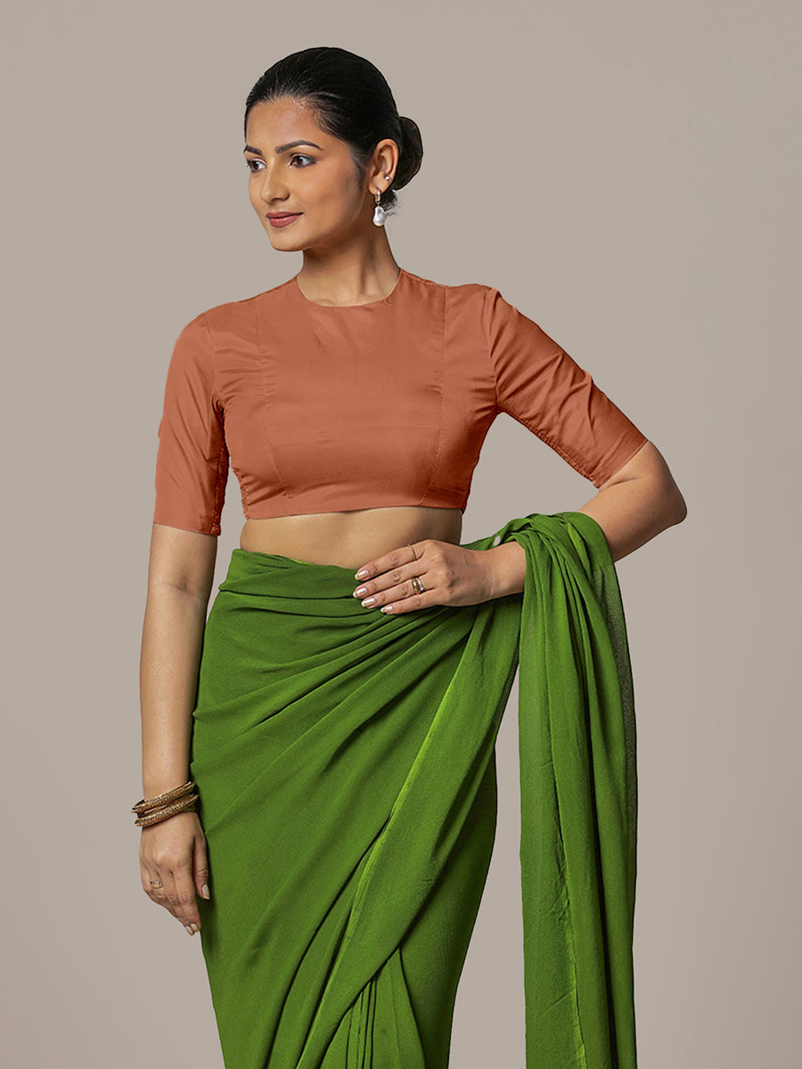 Myra x Rozaana Saree Blouse, in Copper Vegan Silk, featuring elbow sleeves and jewel neckline, made for party & festive.