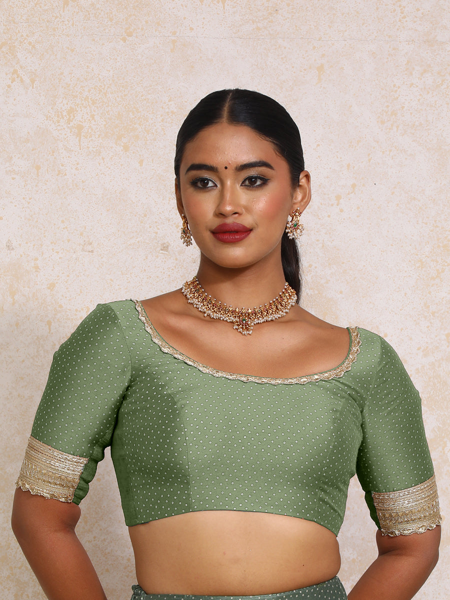 Navika x Tyohaar Saree Blouse, in Green Chandheri, featuring elbow sleeves and scoop neckline, made for party & festive.