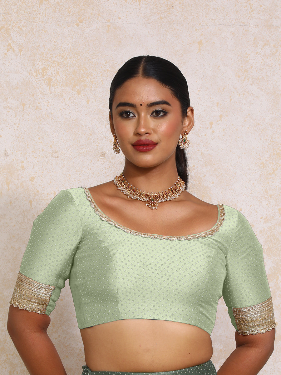 Navika x Tyohaar Saree Blouse, in Green Chandheri, featuring elbow sleeves and scoop neckline, made for party & festive.