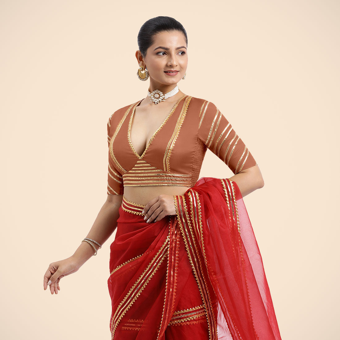 Navya x Tyohaar Saree Blouse, in Copper Vegan Silk, featuring elbow sleeves and v-neckline, made for party & festive.