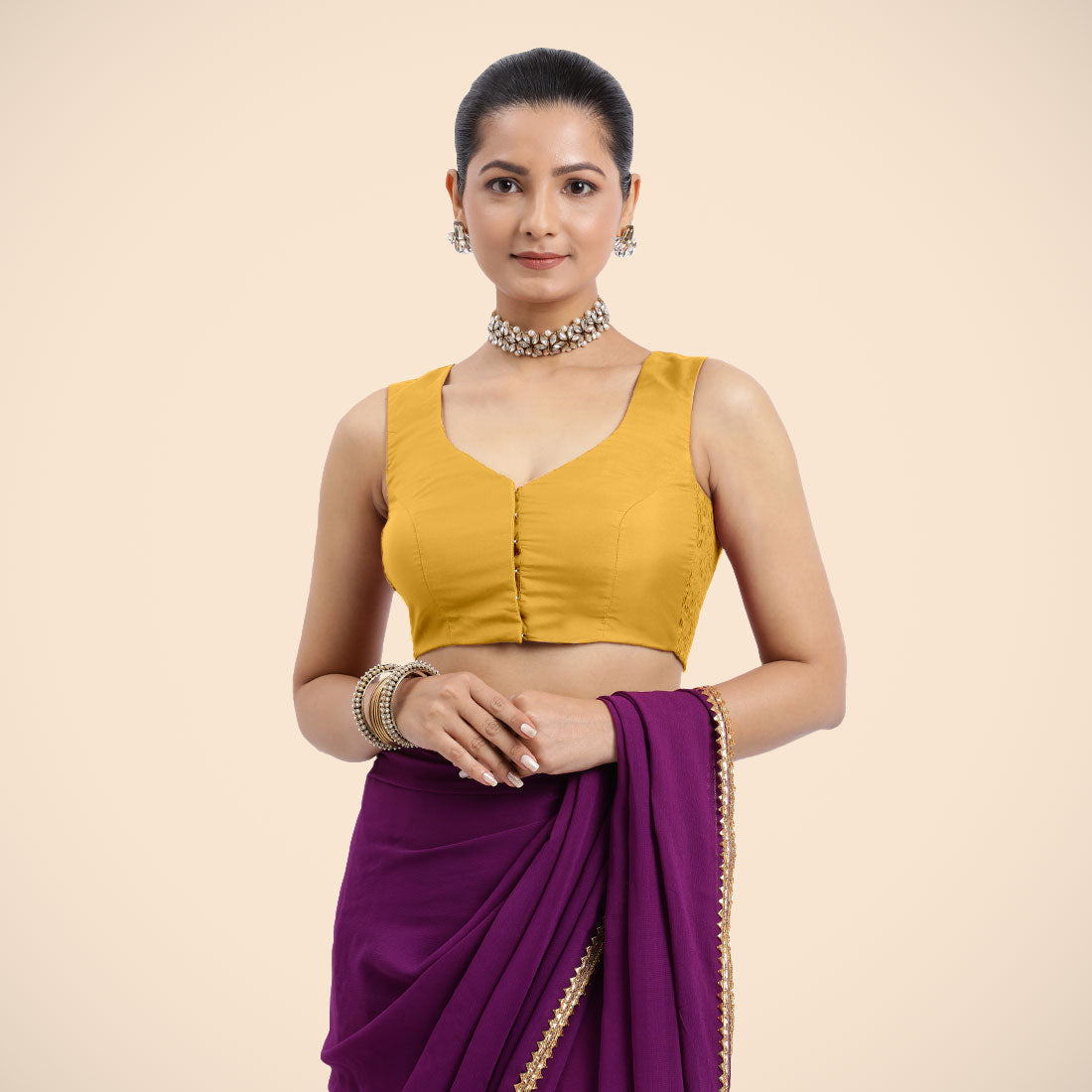 Nazia x Rozaana Saree Blouse, in Yellow Artificial Silk, featuring sleeveless and curved v-neckline, made for daily & work.