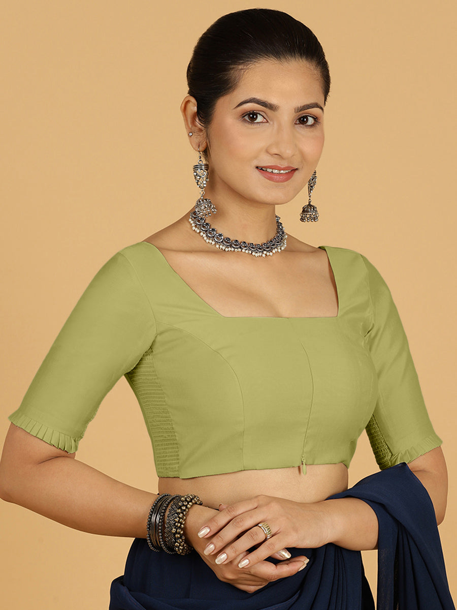 Nihira x Rozaana Saree Blouse, in Green Viscose, featuring elbow sleeves and stylised neckline, made for daily & work.
