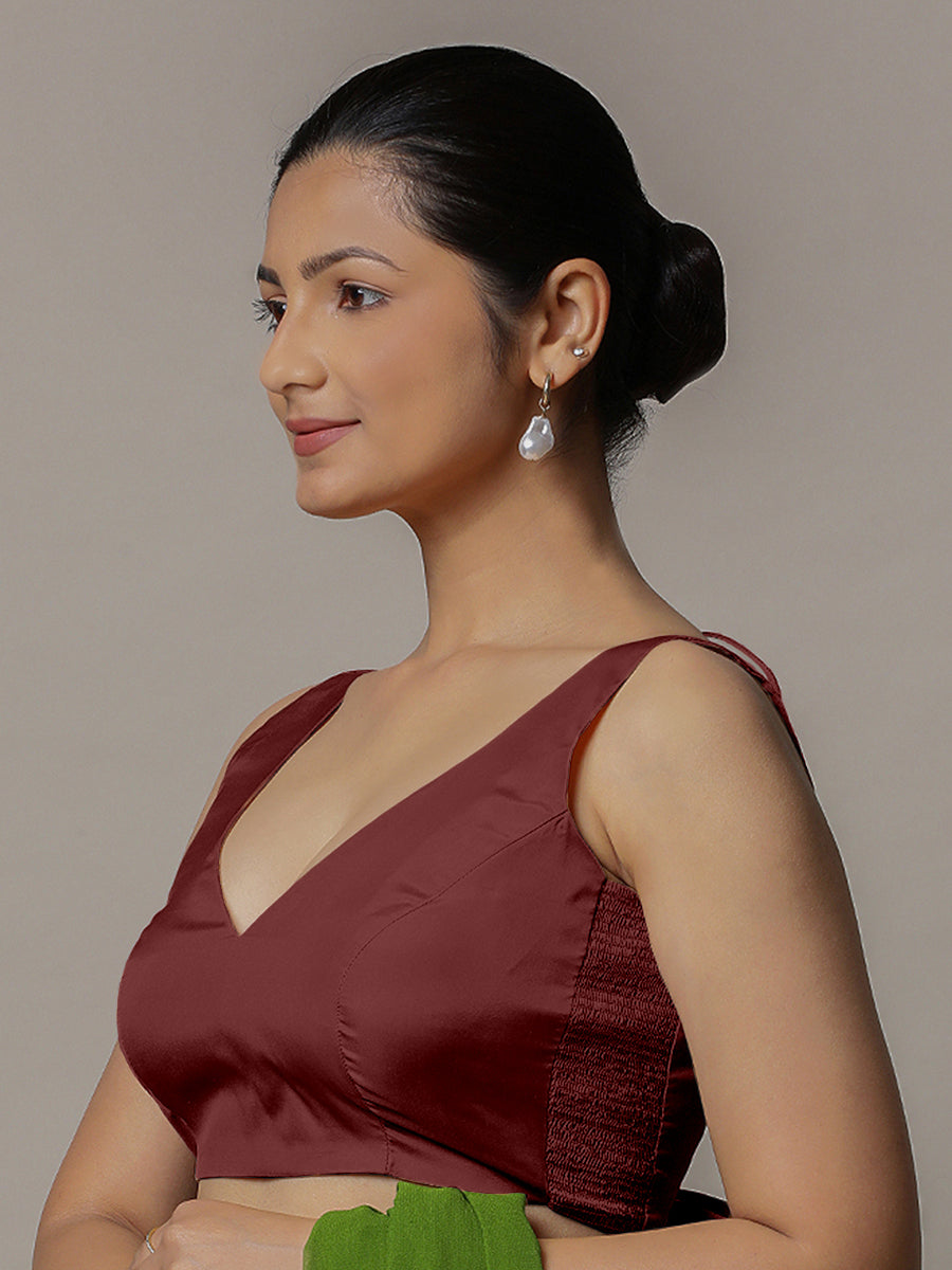 Raisa x Rozaana Saree Blouse, in Maroon Vegan Silk, featuring sleeveless and curved v-neckline, made for party & festive.
