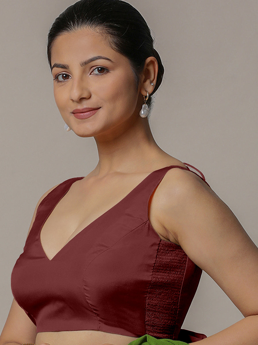 Raisa x Rozaana Saree Blouse, in Maroon Vegan Silk, featuring sleeveless and curved v-neckline, made for party & festive.