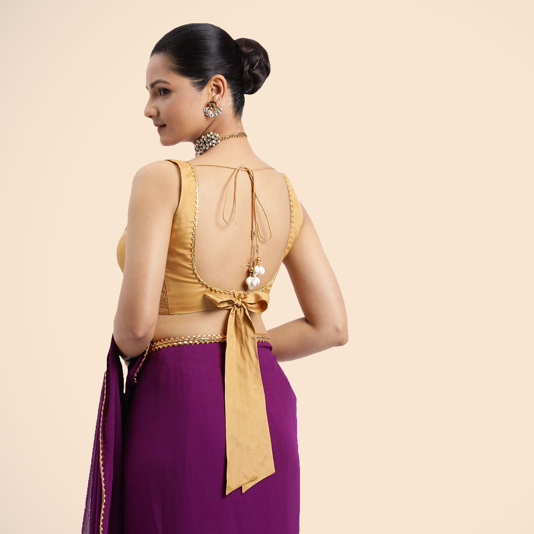 Raisa x Tyohaar Saree Blouse, in Gold Vegan Silk, featuring sleeveless and curved v-neckline, made for party & festive (view 2).