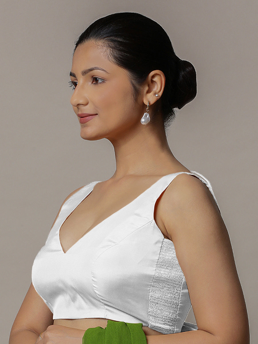 Raisa x Rozaana Saree Blouse, in White Vegan Silk, featuring sleeveless and curved v-neckline, made for party & festive.