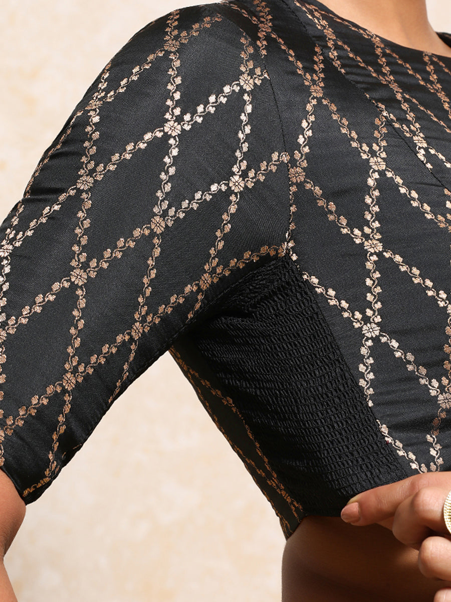 Reena x Tyohaar Saree Blouse, in Black Viscose Silk Brocade, featuring elbow sleeves and jewel neckline (view 3).