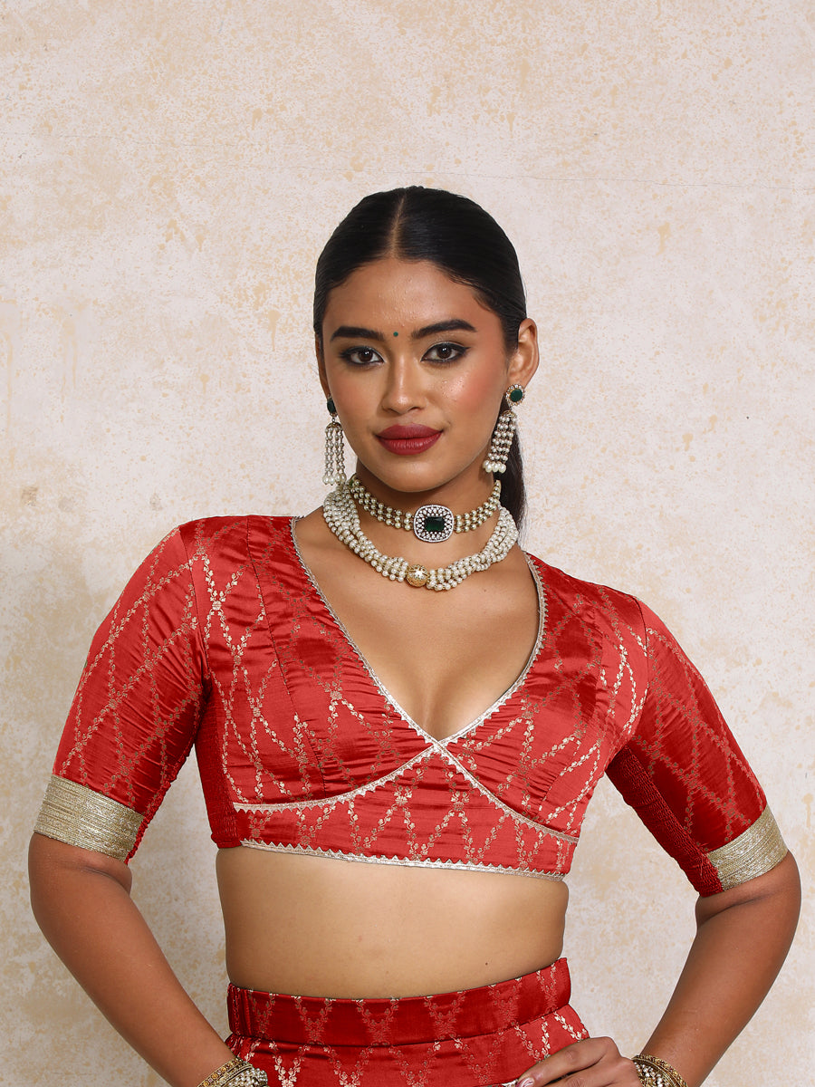 Rivya x Tyohaar Saree Blouse, in Red Viscose Silk Brocade, featuring elbow sleeves and v-neckline, made for party & festive.