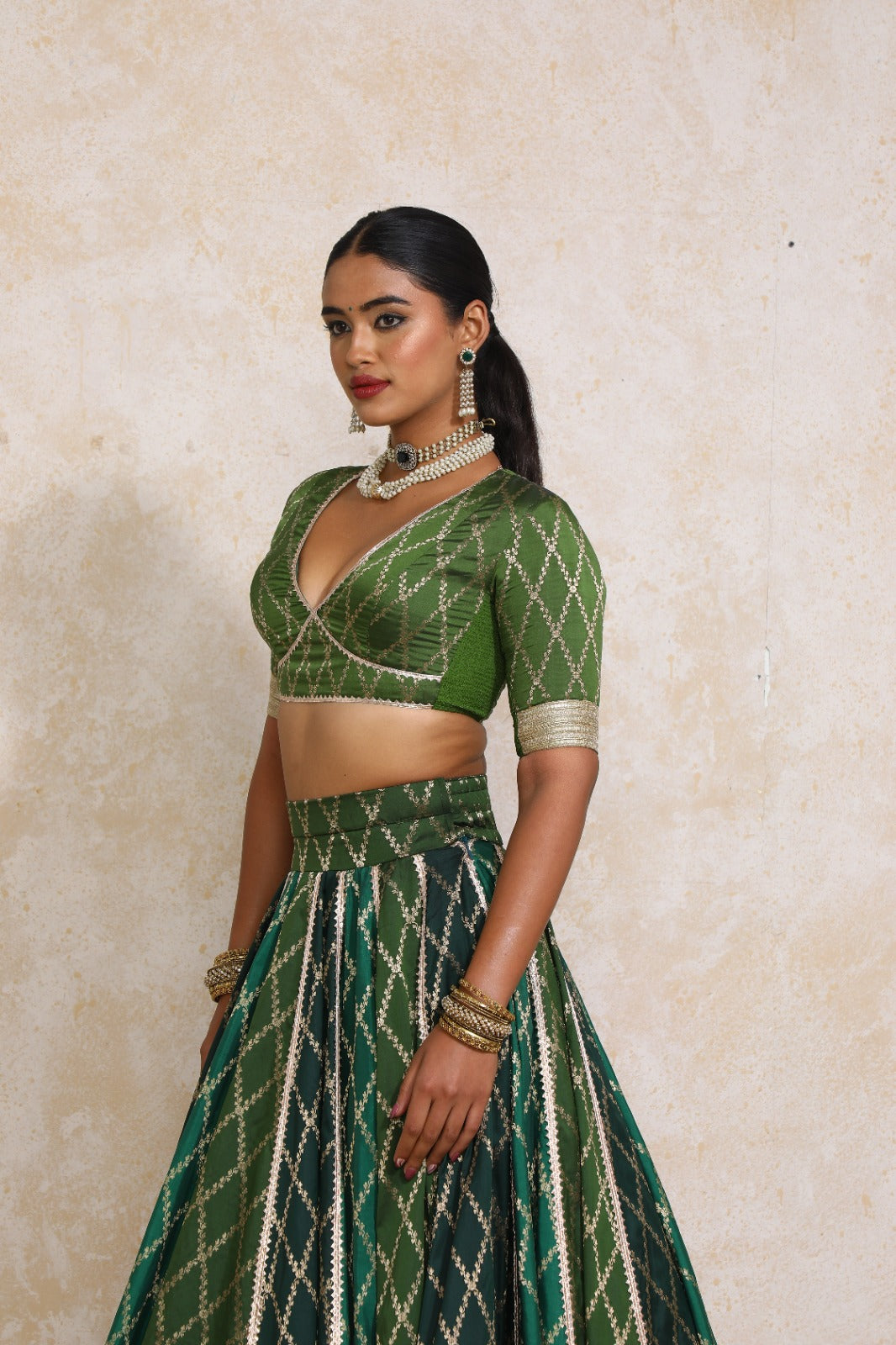 Rivya x Tyohaar Saree Blouse, in Green Viscose Silk Brocade, featuring elbow sleeves and v-neckline (view 7).