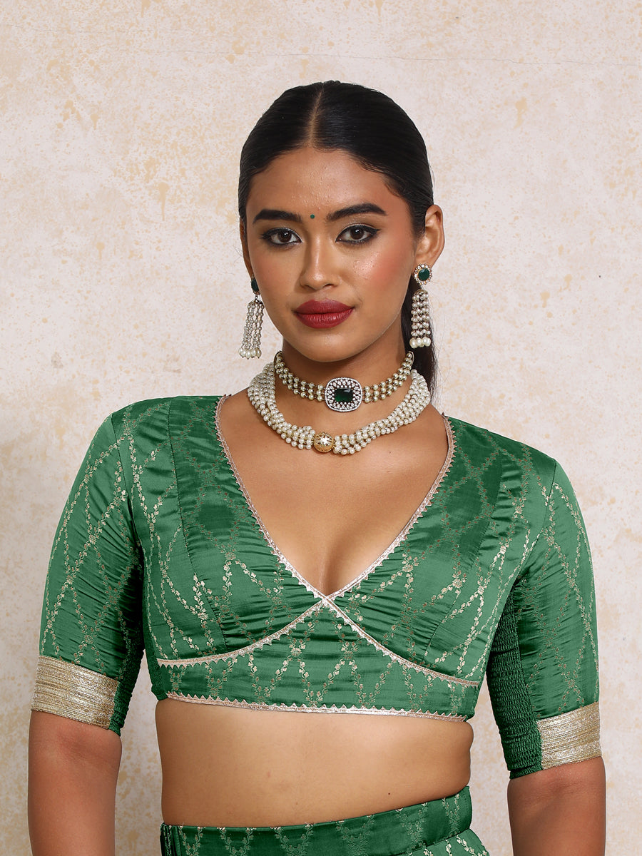 Rivya x Tyohaar Saree Blouse, in Green Viscose Silk Brocade, featuring elbow sleeves and v-neckline (view 6).