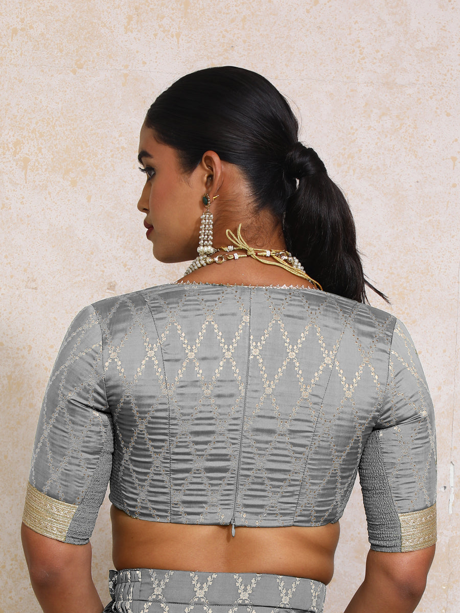 Rivya x Tyohaar Saree Blouse, in Grey Viscose Silk Brocade, featuring elbow sleeves and v-neckline, made for party & festive.