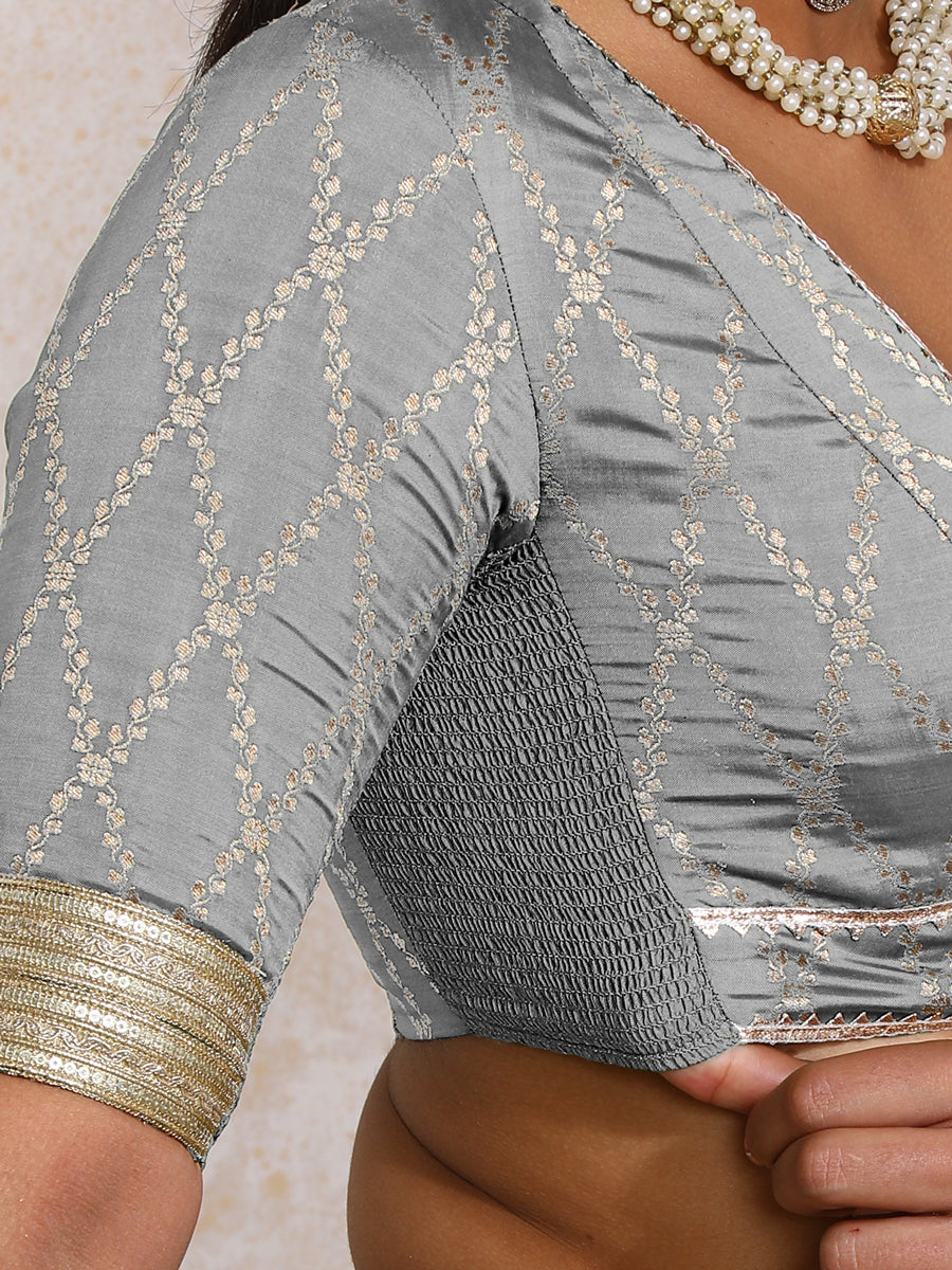 Rivya x Tyohaar Saree Blouse, in Grey Viscose Silk Brocade, featuring elbow sleeves and v-neckline, made for party & festive.