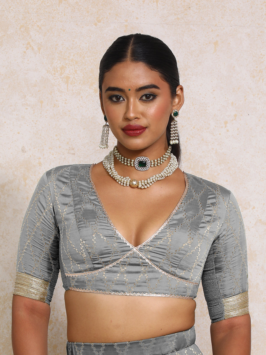 Rivya x Tyohaar Saree Blouse, in Grey Viscose Silk Brocade, featuring elbow sleeves and v-neckline, made for party & festive.