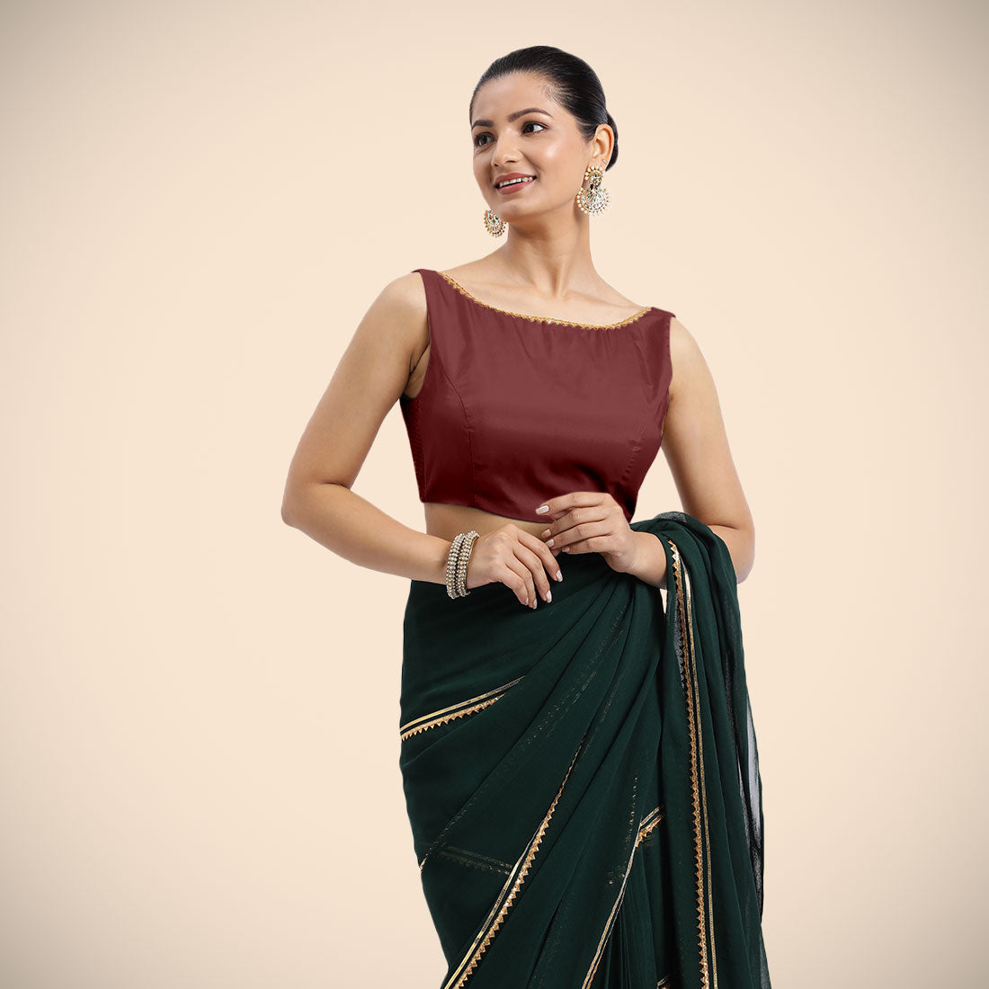Sherry x Tyohaar Saree Blouse, in Maroon Vegan Silk, featuring sleeveless and boat neckline, made for party & festive.