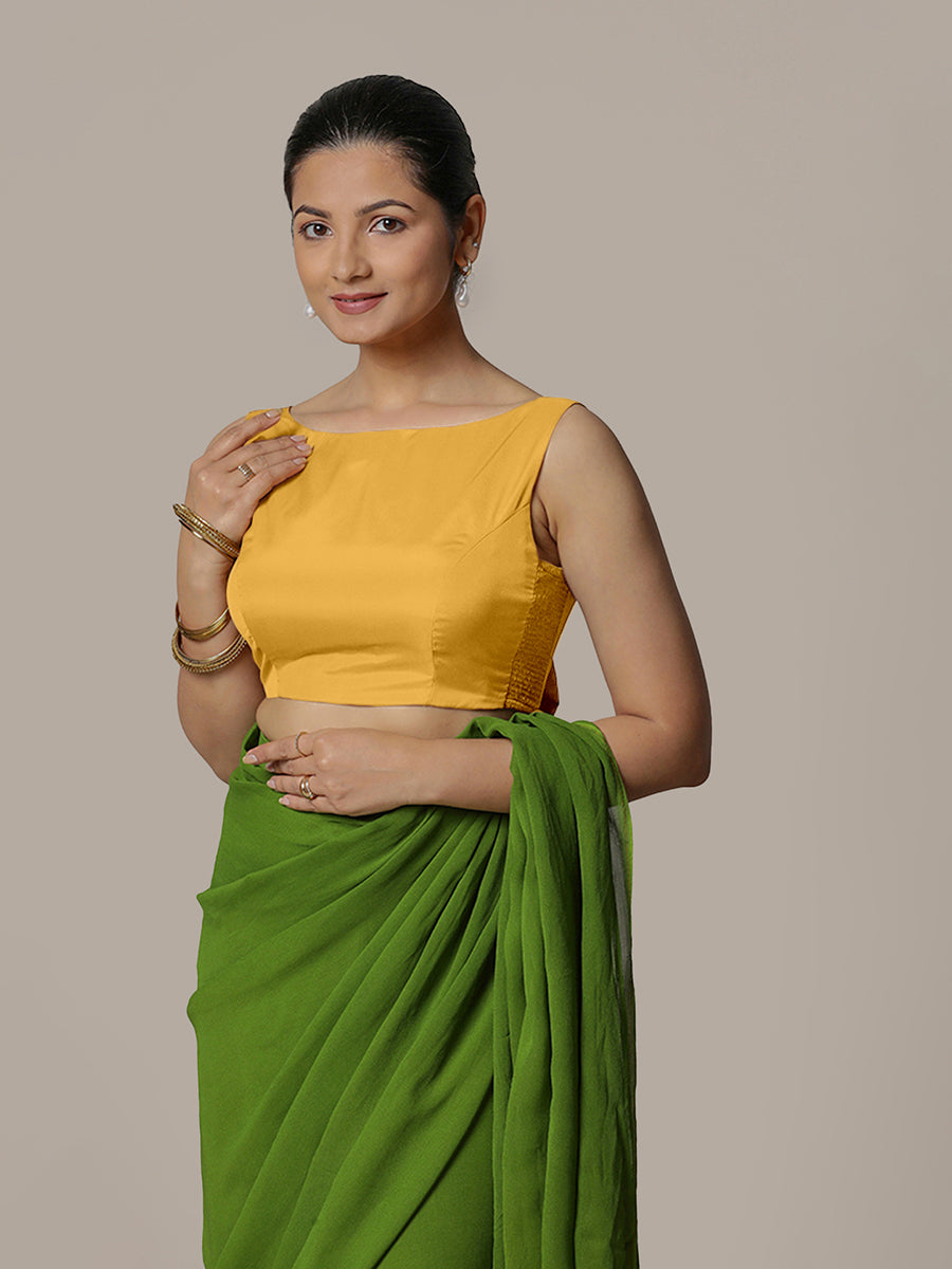 Sherry x Rozaana Saree Blouse, in Yellow Artificial Silk, featuring sleeveless and boat neckline, made for party & festive.