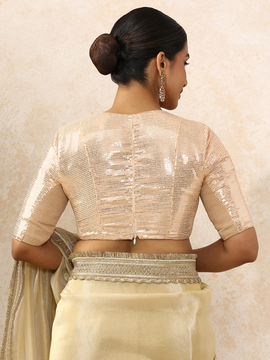 Shireen x Tyohaar Saree Blouse, in Cream Sequin Fabric, featuring elbow sleeves and v-neckline, made for party & festive.