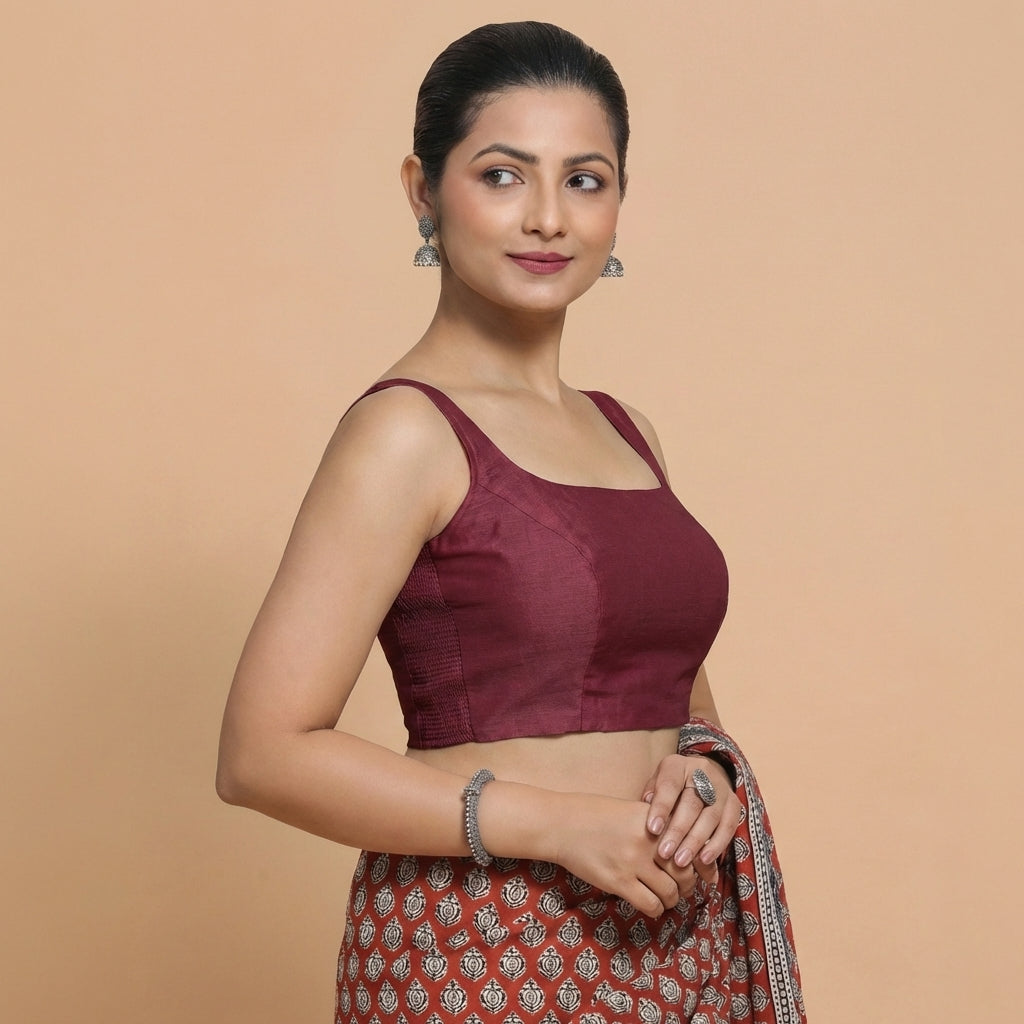 Sushmita x Rozaana Saree Blouse, in Maroon Chandheri, featuring sleeveless and round neckline, made for party & festive.