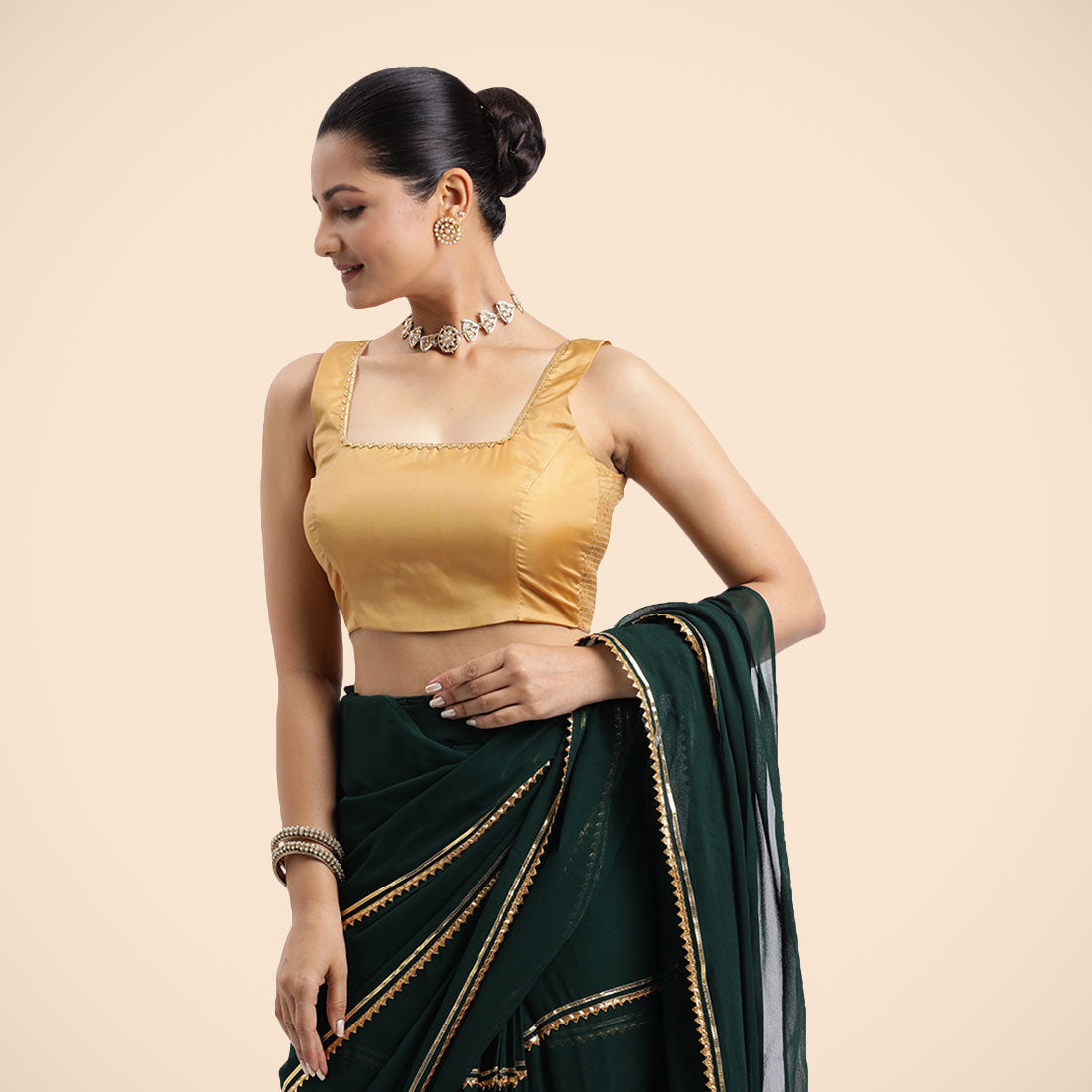 Tanvi x Tyohaar Saree Blouse, in Gold Vegan Silk, featuring sleeveless and square neckline, made for party & festive (view 2).