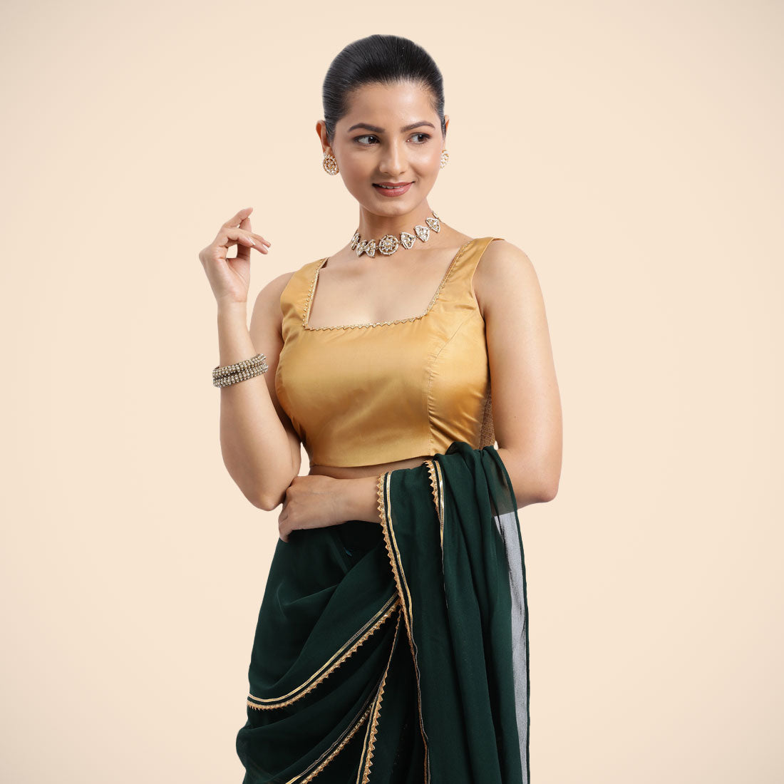 Tanvi x Tyohaar Saree Blouse, in Gold Vegan Silk, featuring sleeveless and square neckline, made for party & festive (view 3).