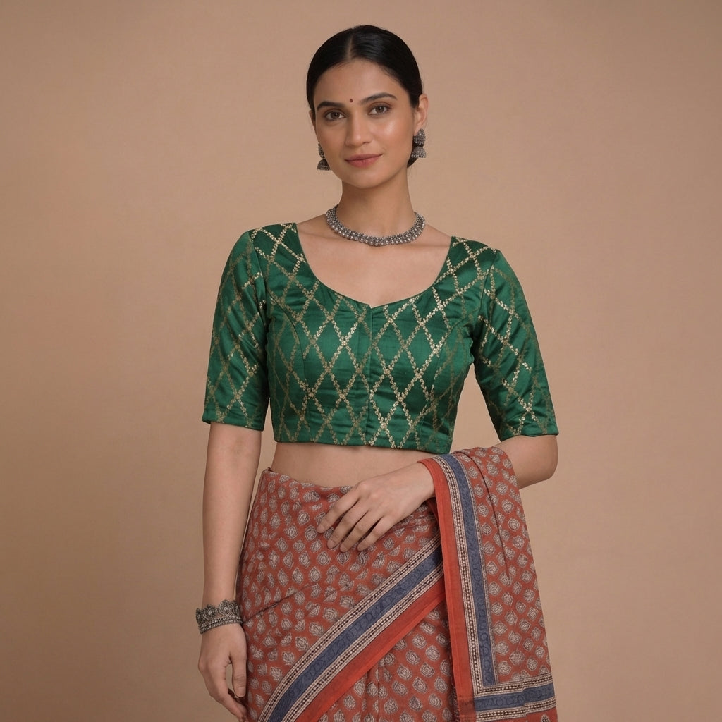 Vartika x Tyohaar Saree Blouse, in Green Viscose Silk Brocade, featuring elbow sleeves and round neckline.