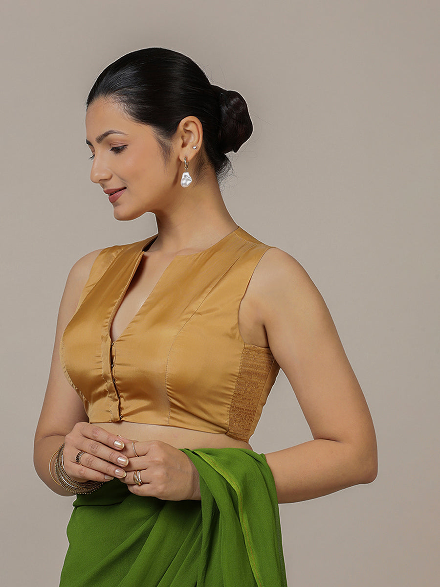 Veena x Rozaana Saree Blouse, in Gold Vegan Silk, featuring sleeveless and curved v-neckline, made for party & festive.