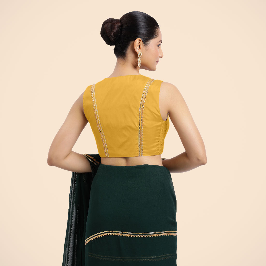 Veena x Tyohaar Saree Blouse, in Yellow Vegan Silk, featuring sleeveless and curved v-neckline, made for party & festive.