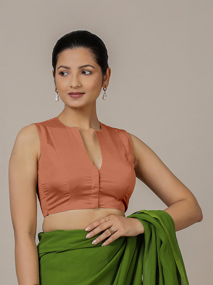 Veena x Rozaana Saree Blouse, in Copper Vegan Silk, featuring sleeveless and curved v-neckline, made for party & festive.