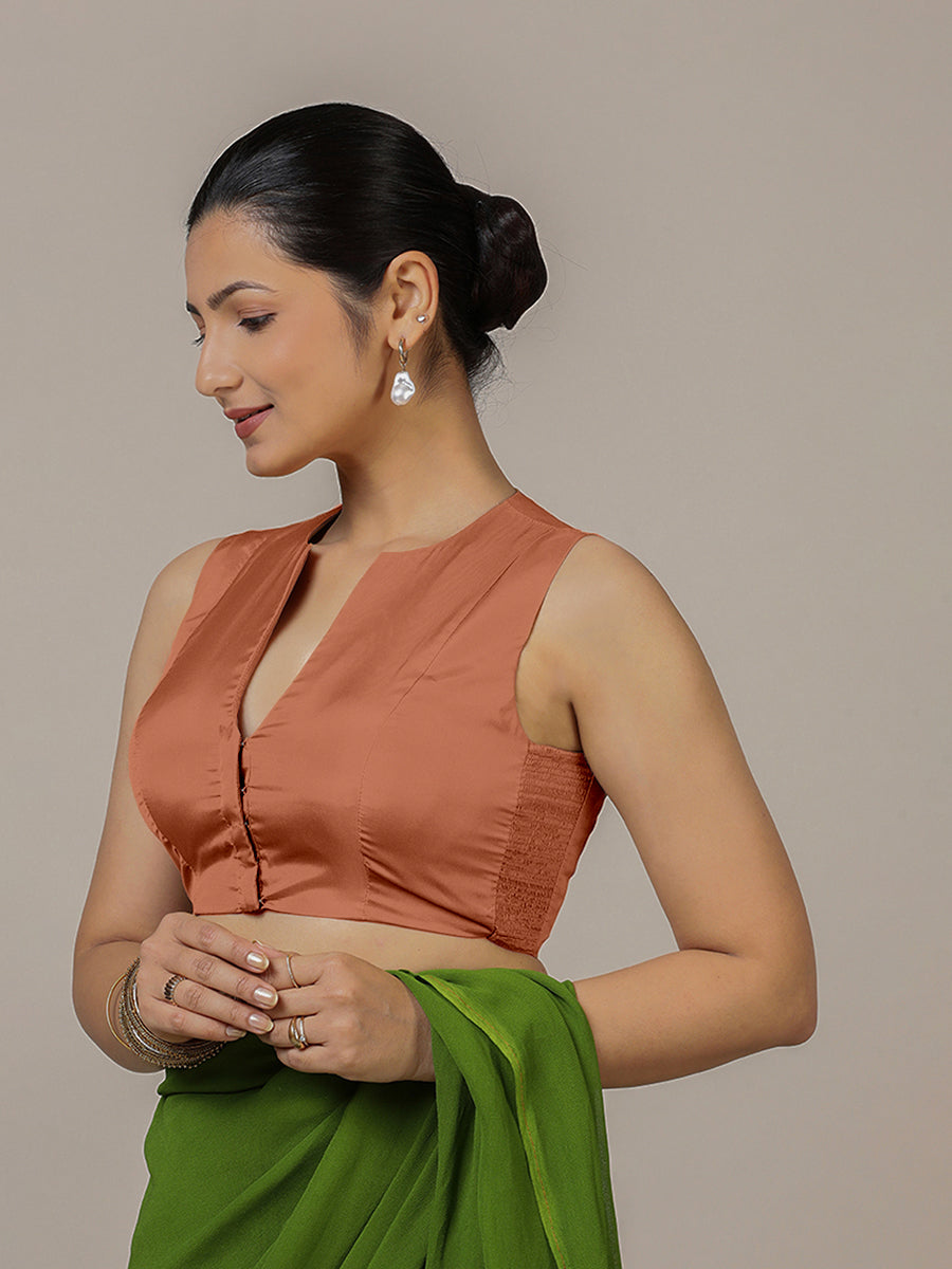 Veena x Rozaana Saree Blouse, in Copper Vegan Silk, featuring sleeveless and curved v-neckline, made for party & festive.