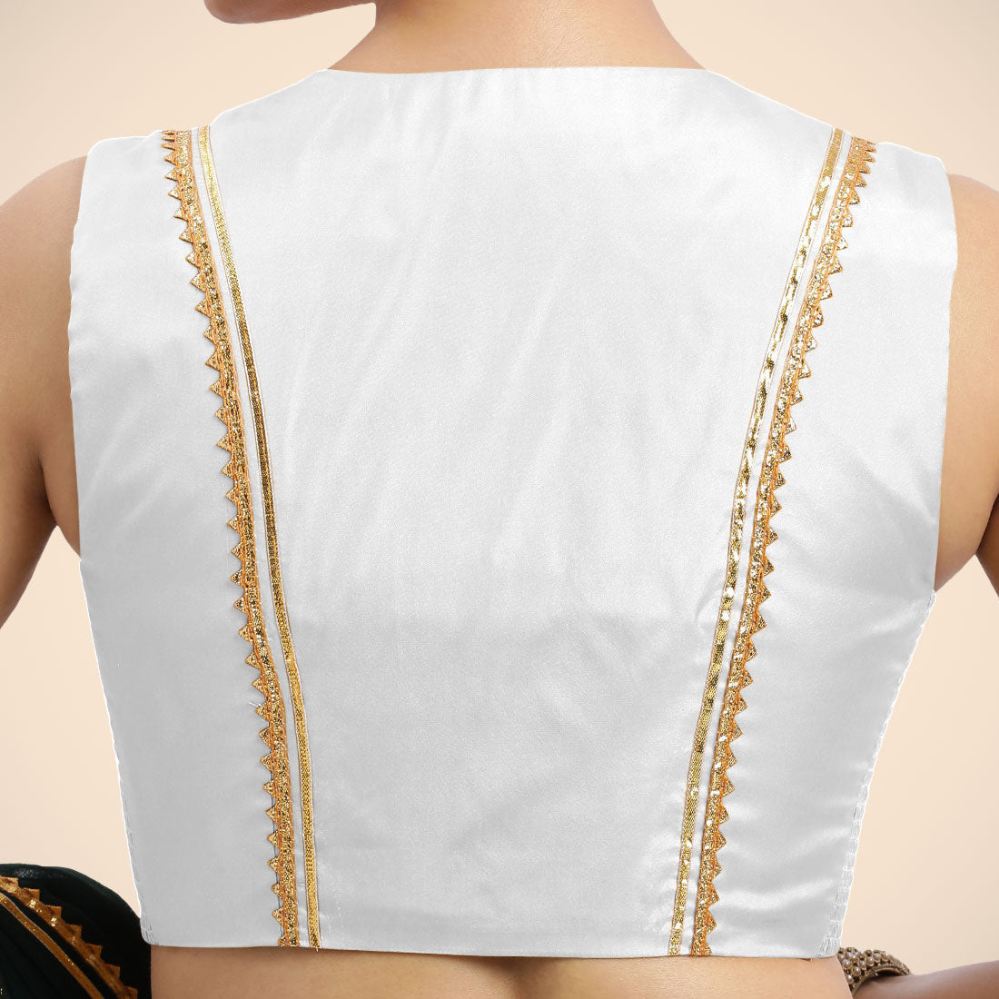 Veena x Tyohaar Saree Blouse, in White Vegan Silk, featuring sleeveless and curved v-neckline, made for party & festive.