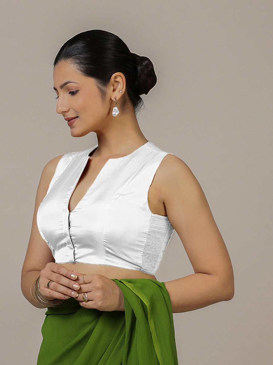 Veena x Rozaana Saree Blouse, in White Vegan Silk, featuring sleeveless and curved v-neckline, made for party & festive.