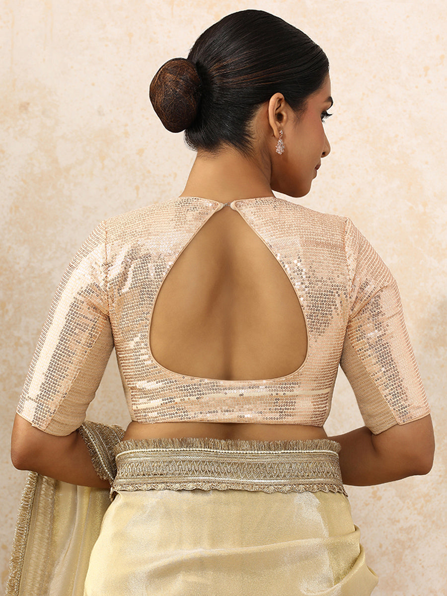 Yashvi x Tyohaar Saree Blouse, in Cream Sequin Fabric, featuring elbow sleeves and pot neckline, made for party & festive.