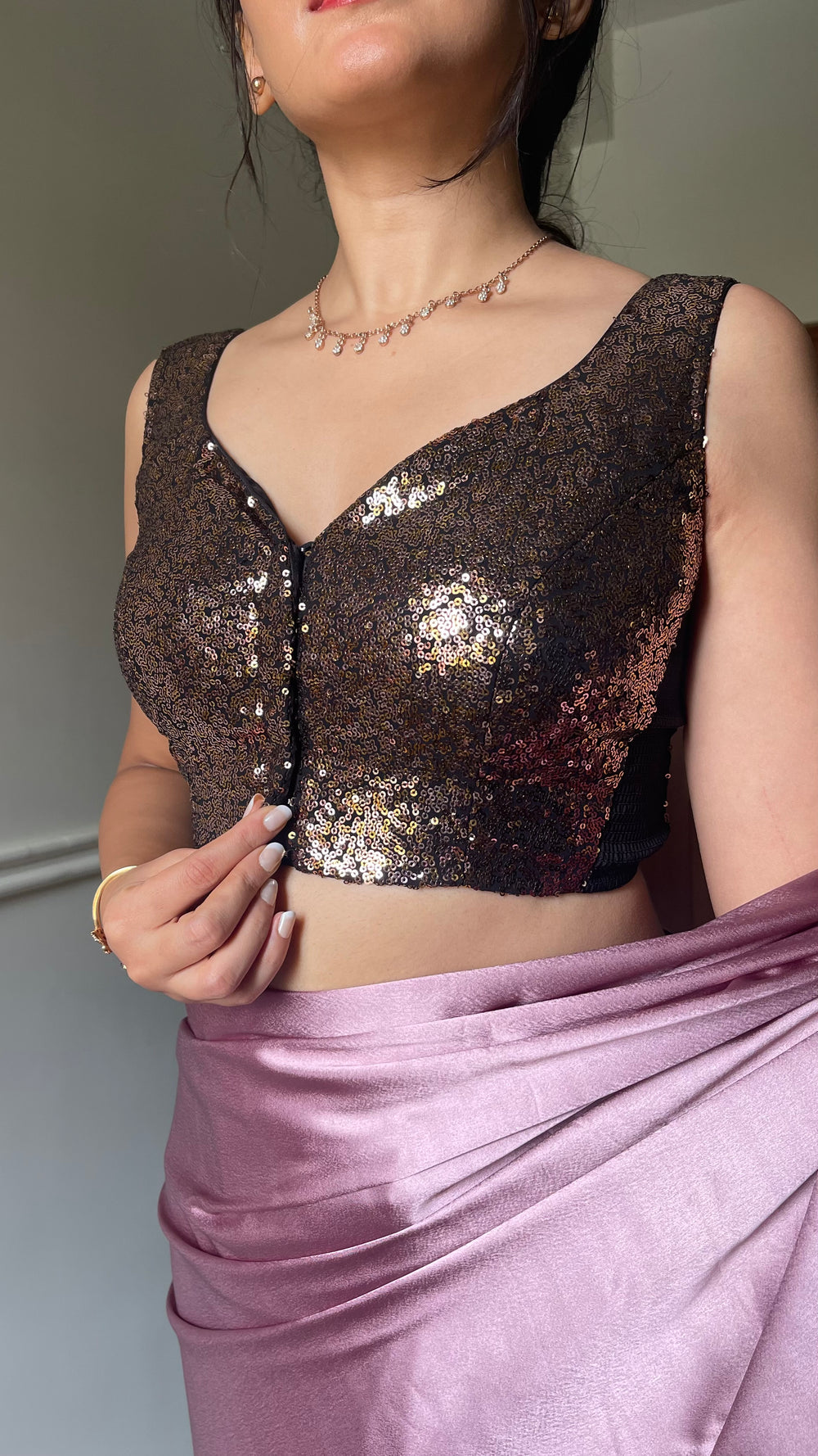 Zia x Tyohaar | Sleeveless Black & Gold Sequined Shimmer Saree Blouse with Sweetheart Neck