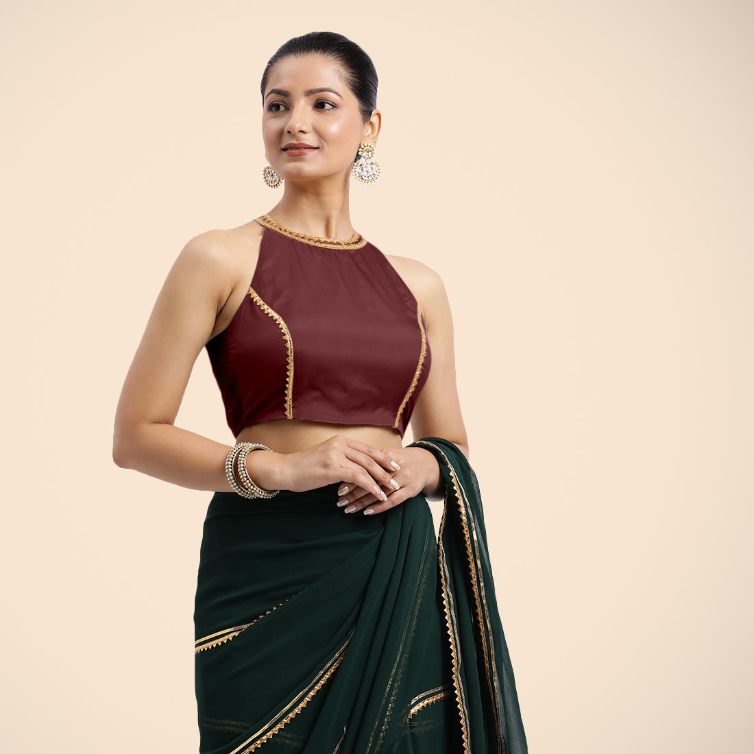 Zubeida x Tyohaar Saree Blouse, in Maroon Vegan Silk, featuring sleeveless and halter neckline, made for party & festive.